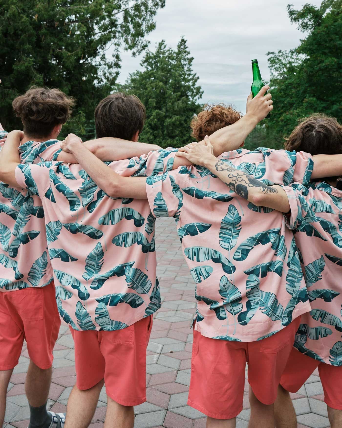 Group of friends celebrating in matching outfits