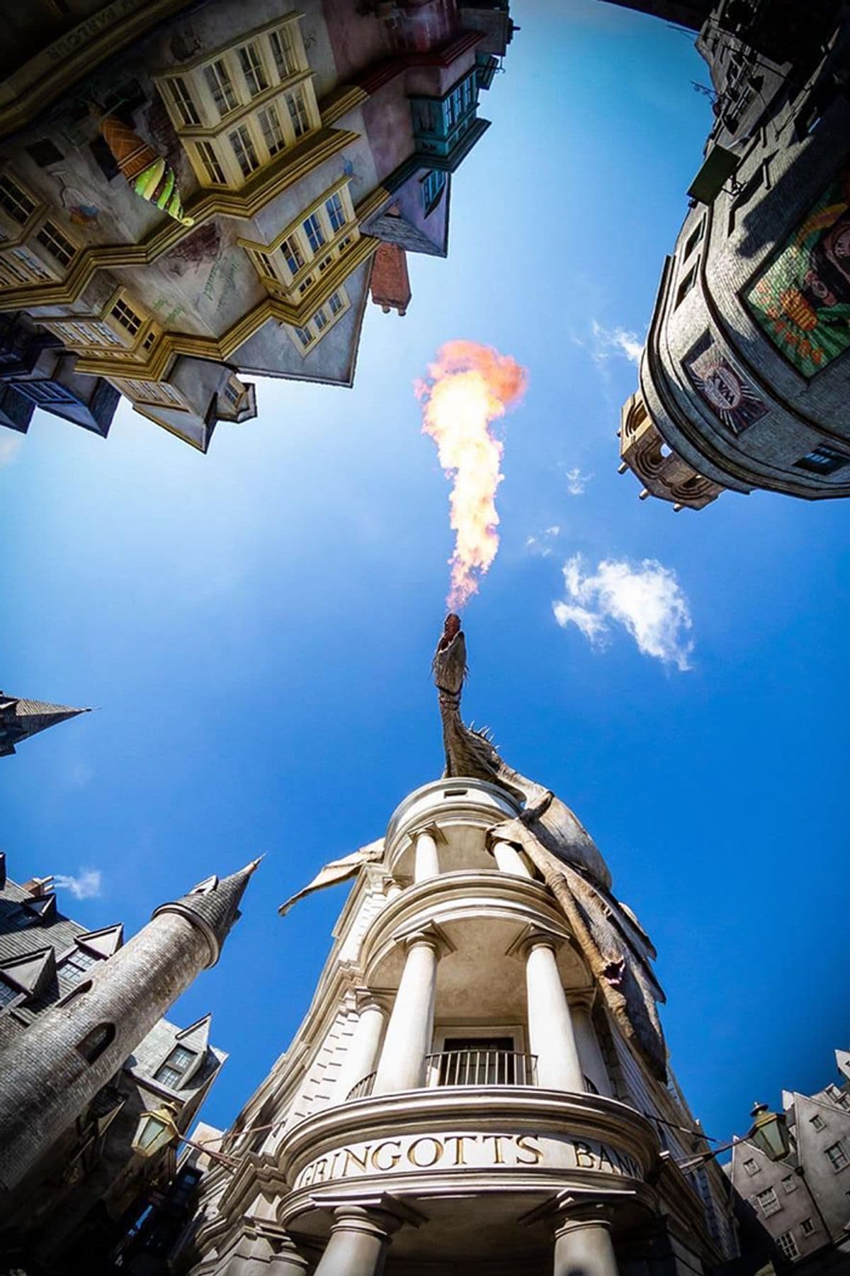 Dragon breathing fire above Gringotts Bank at Universal Orlando