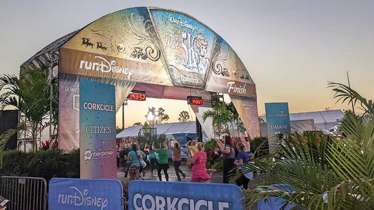 runDisney finish line at sunset — the moment your legs earned the pool
