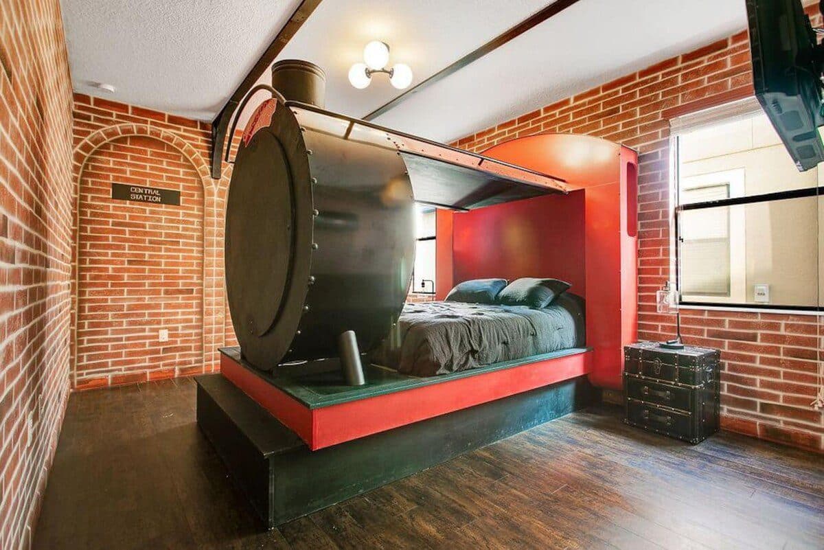 Grand Platform Suite — king bed, castle turrets, your reward after 26.2 miles