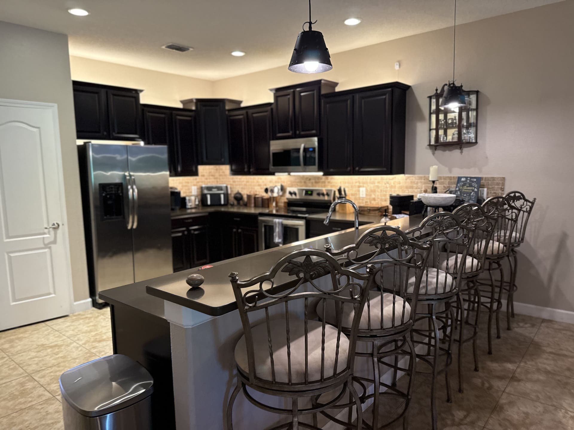 The Alchemist's Kitchen — full gourmet setup with three coffee systems